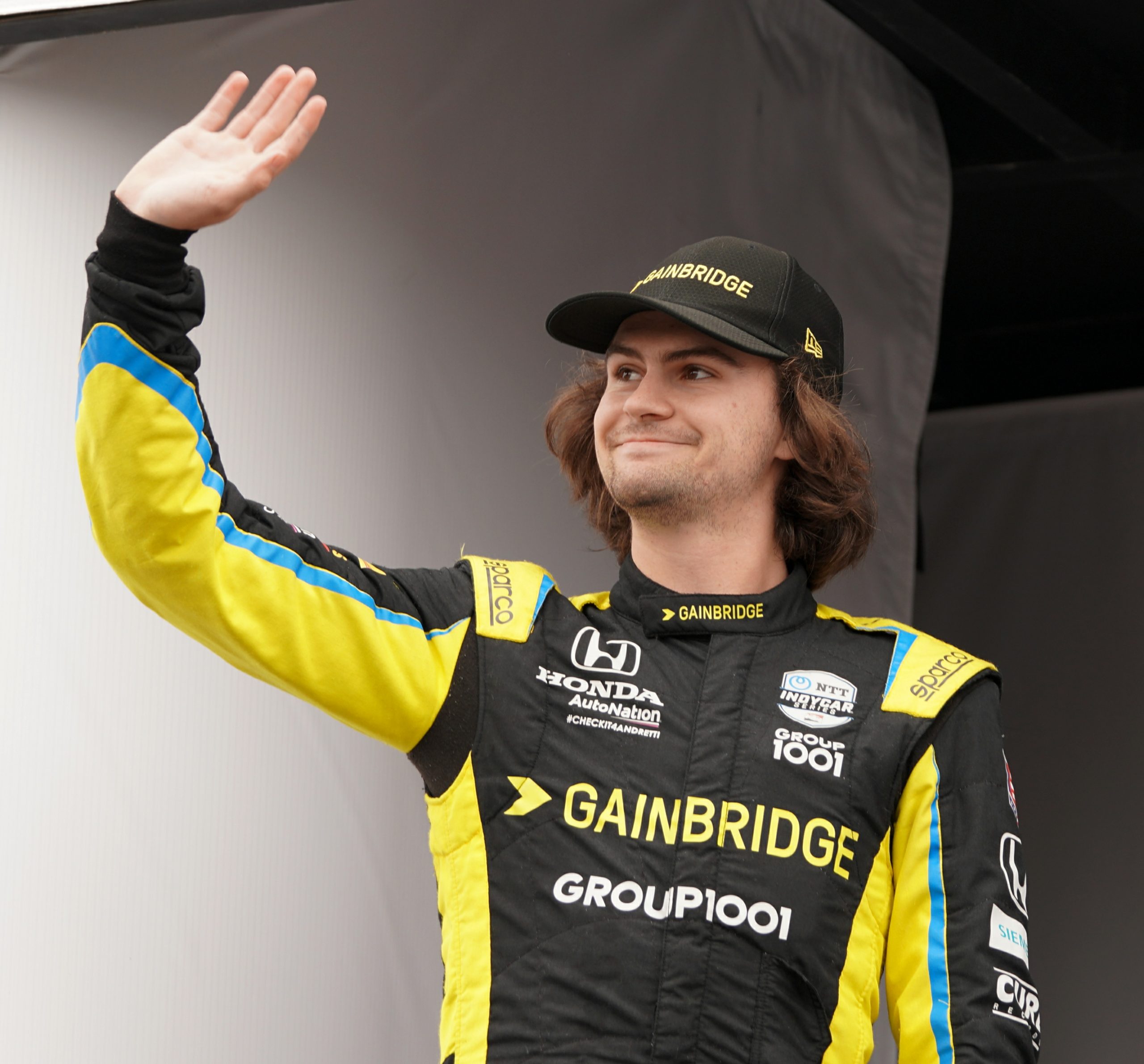 Colton Herta waves to the fans before the start of the Acura Grand Prix of Long Beach. He might as well have been waving goodbye to the other 27 competitors as he stormed his way from 14th to 1st!