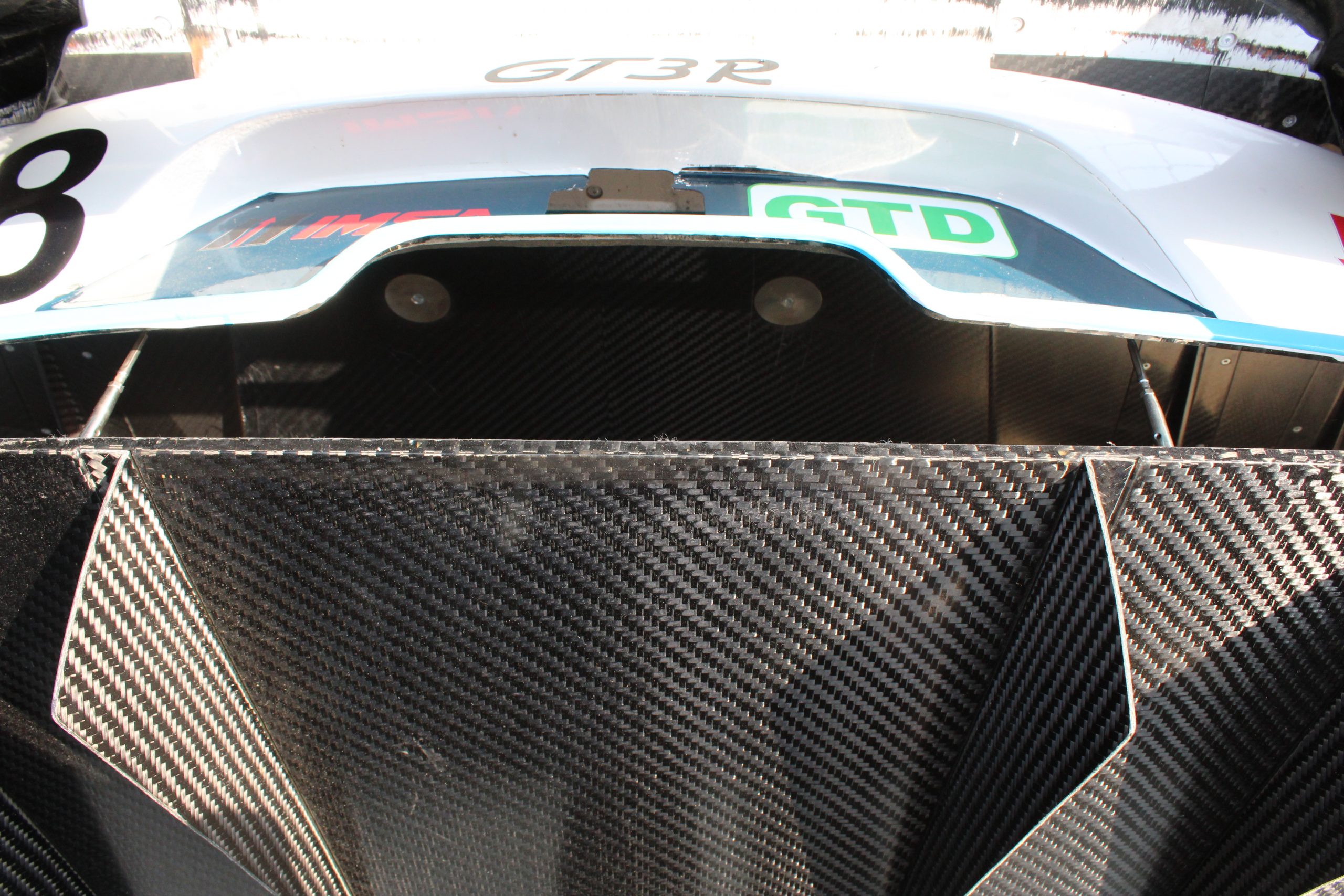 This carbon fiber rear diffuser and tail section show off the hi-tech nature of the current IMSA GTD class.