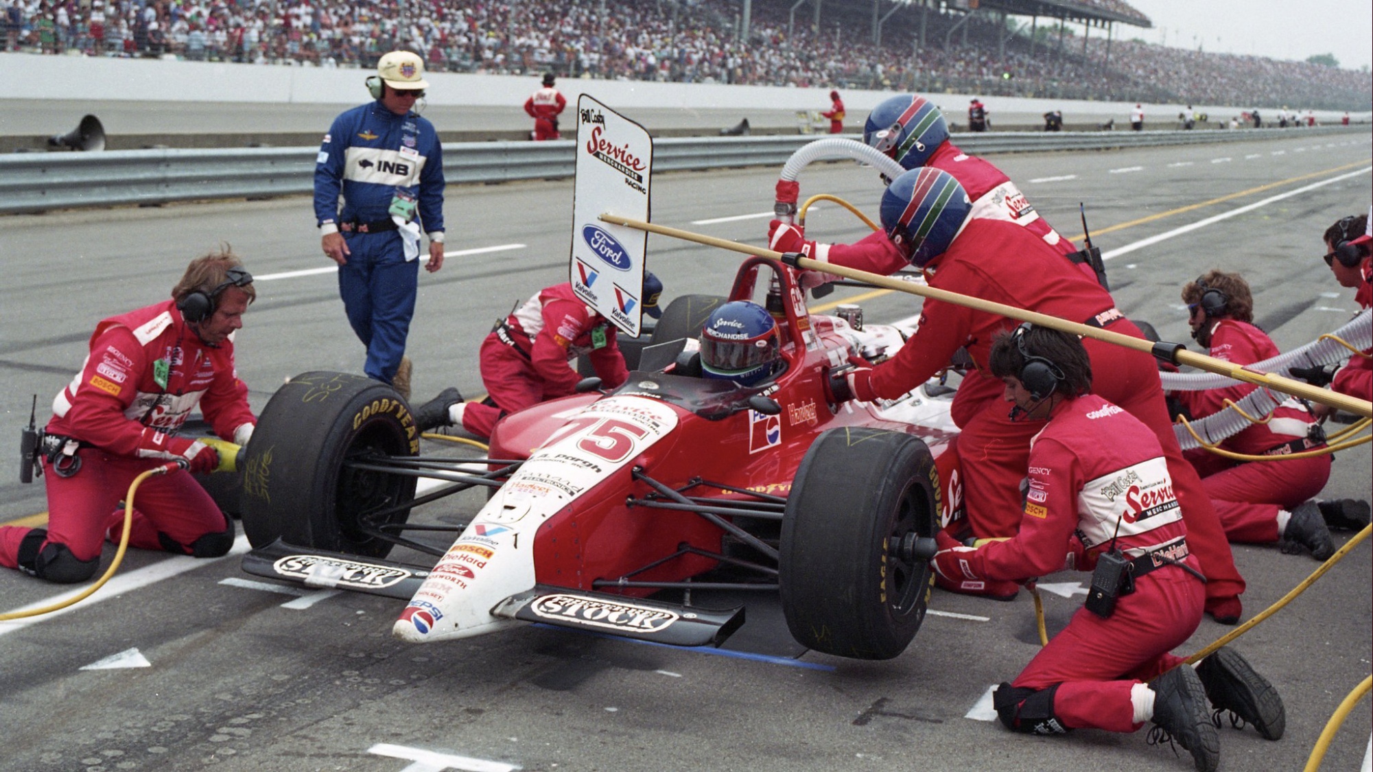 Ribbs receives great service work from his pit crew during at pit stop at the Indy 500.