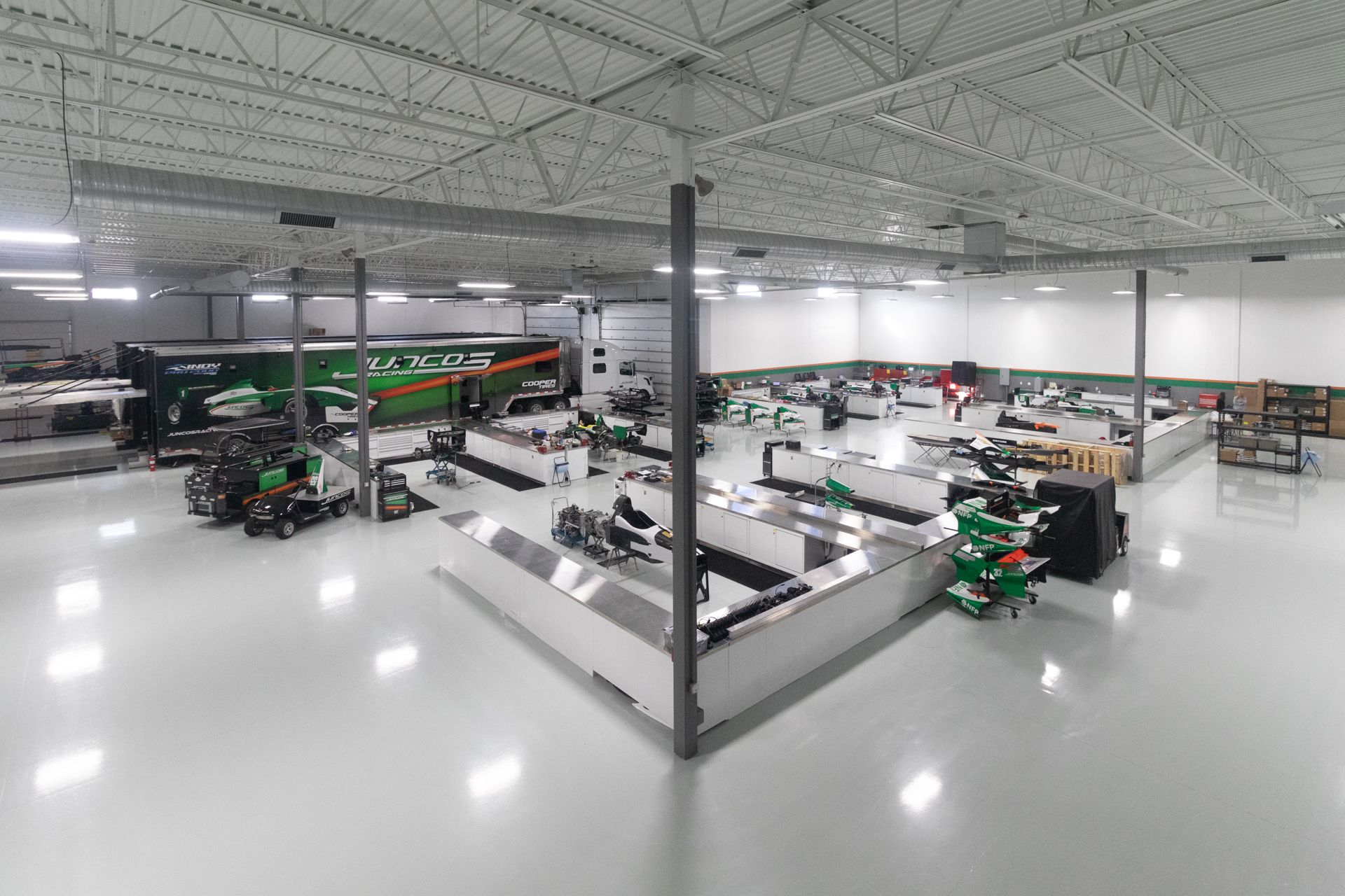 A beautiful clean shop space with room for two transporters and plenty of bays to work on Indy Pro 2000, Indy Lights and IndyCar racing cars, Juncos Hollinger Racing has also prepped IMSA DPi cars here too.